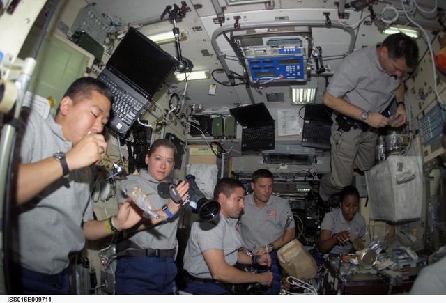 NASA image: Crewmembers share a meal in the SM