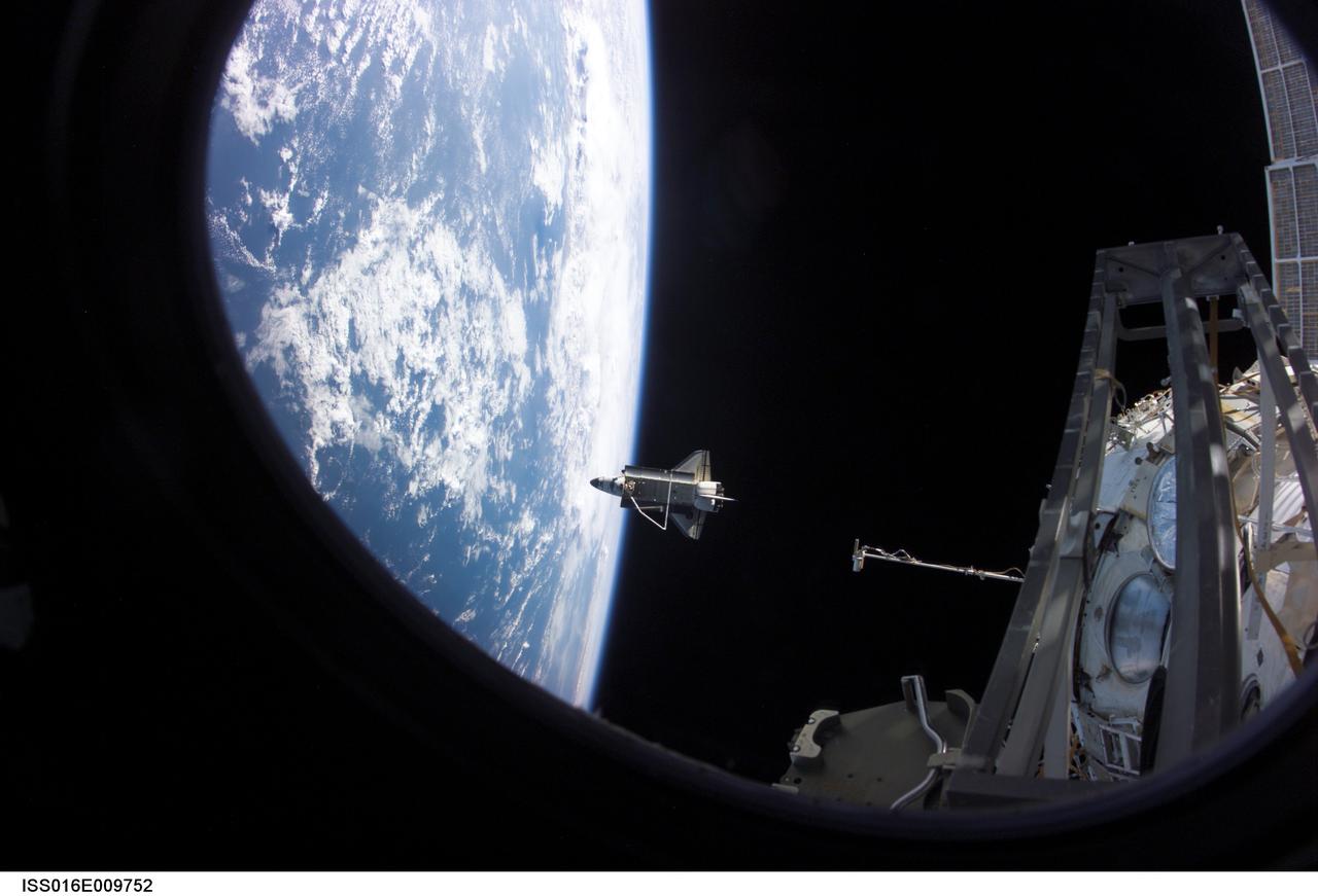 ISS016-E-009752 (5 Nov. 2007) --- Backdropped by the blackness of space and Earth's horizon, Space Shuttle Discovery is featured in this image photographed by an Expedition 16 crewmember after the shuttle undocked from the International Space Station. Earlier the STS-120 and Expedition 16 crews concluded 11 days of cooperative work onboard the shuttle and station. Undocking of the two spacecraft occurred at 4:32 a.m. (CST) on Nov. 5, 2007.