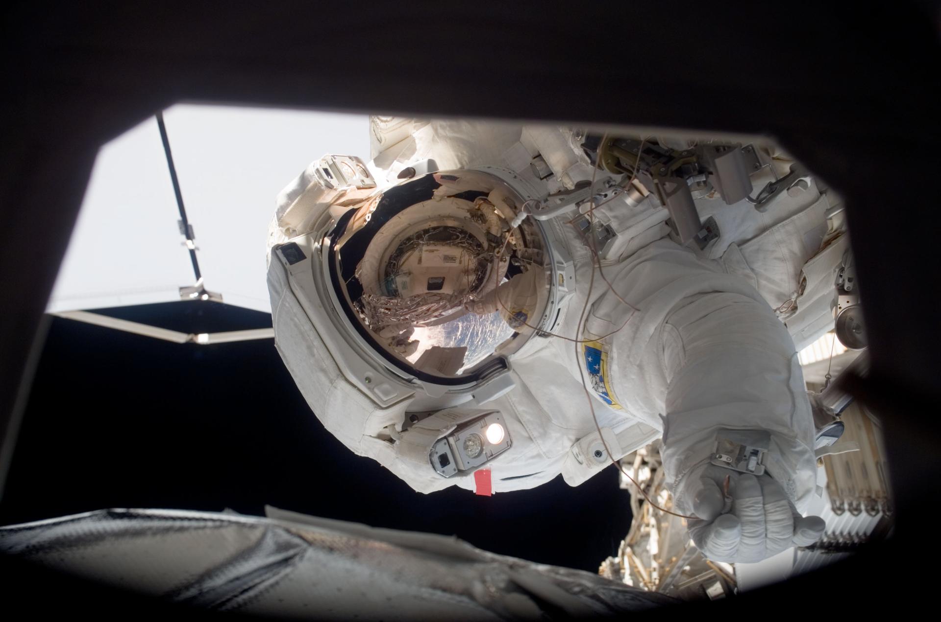 ISS016-E-009989 (9 Nov. 2007) --- Astronaut Peggy A. Whitson, Expedition 16 commander, participates in a session of extravehicular activity (EVA) as construction continues on the International Space Station (ISS)