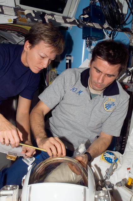 NASA image: Whitson and Malenchenko in the A/L