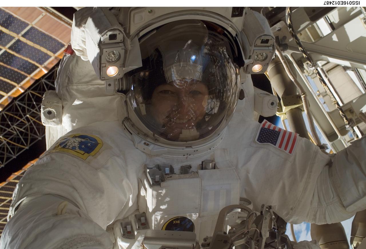 ISS016-E-012487 (24 Nov. 2007) --- Astronaut Peggy Whitson, Expedition 16 commander, participates in a session of extravehicular activity (EVA) as construction continues on the International Space Station. During the 7-hour, 4-minute spacewalk Whitson and astronaut Daniel Tani (out of frame), flight engineer, continued the external outfitting of the Harmony node in its new position in front of the Destiny laboratory.