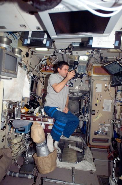 NASA image: Malenchenko with camera in the SM
