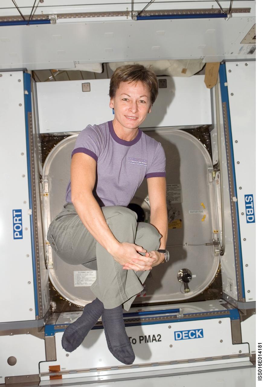 ISS016-E-014181 (1 Dec. 2007) --- Astronaut Peggy A. Whitson, Expedition 16 commander, poses for a photo while floating in the Harmony node of the International Space Station.