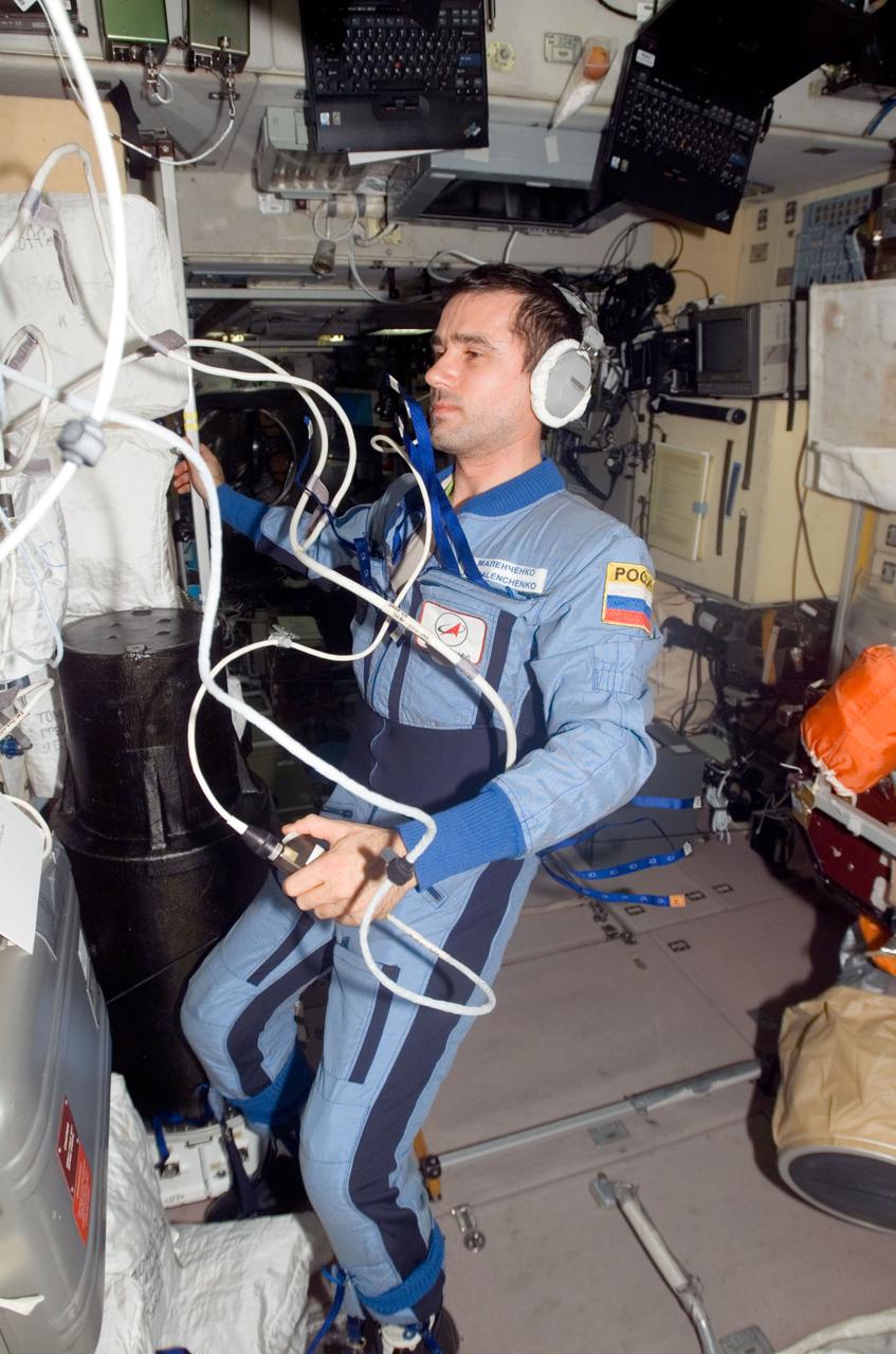 ISS016-E-022134 (9 Jan. 2008) --- Cosmonaut Yuri I. Malenchenko, Expedition 16 flight engineer representing Russia's Federal Space Agency, uses a communication system while working in the Zvezda Service Module of the International Space Station.