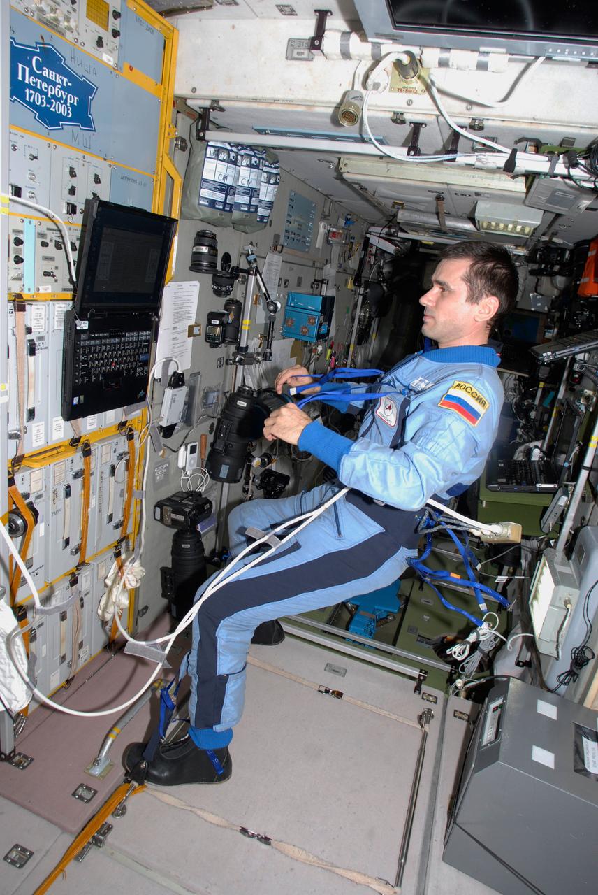 ISS016-E-022540 (13 Jan. 2008) --- Cosmonaut Yuri I. Malenchenko, Expedition 16 flight engineer representing Russia's Federal Space Agency, watches a computer monitor in the Zvezda Service Module of the International Space Station.