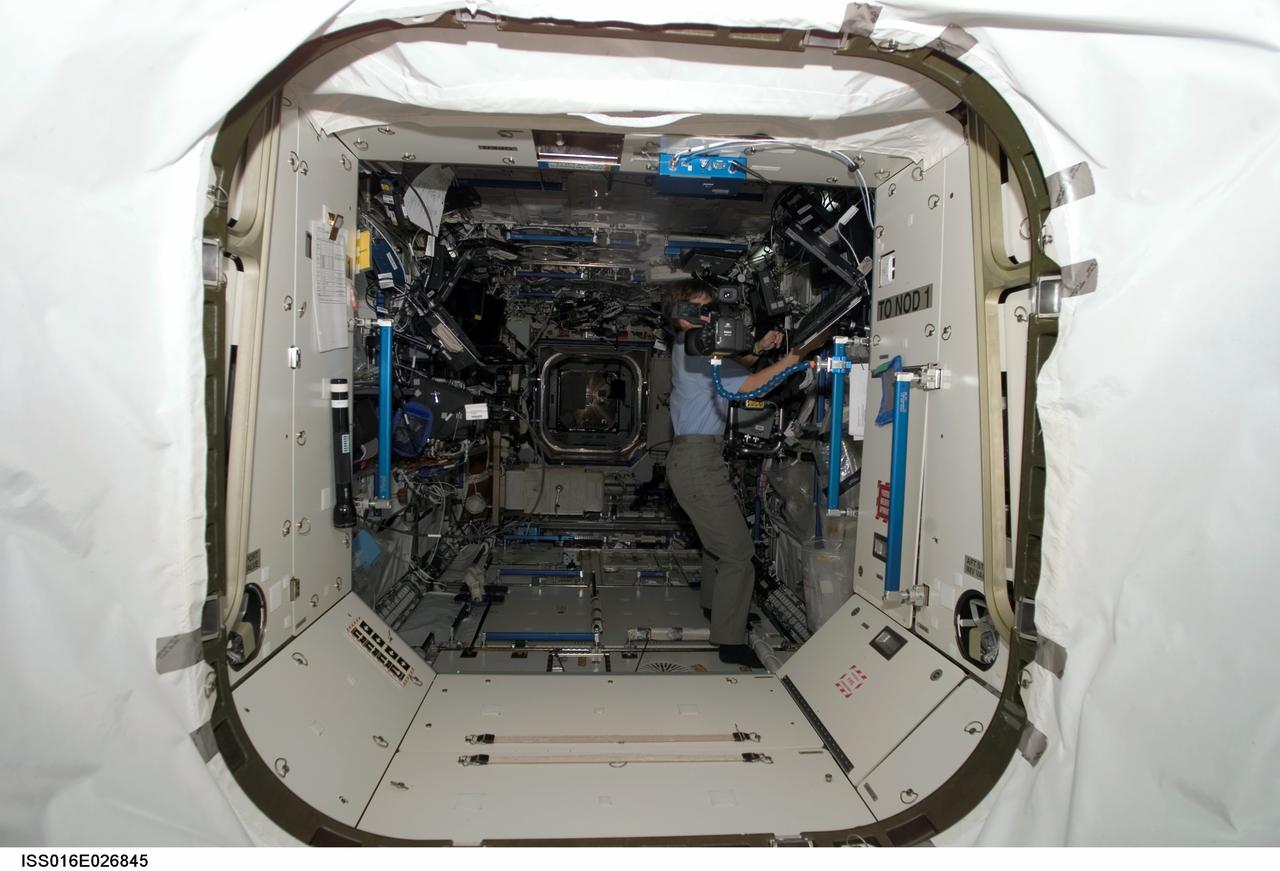 ISS016-E-026845 (3 Feb. 2008) --- Astronaut Peggy Whitson, Expedition 16 commander, works in the Destiny laboratory of the International Space Station.