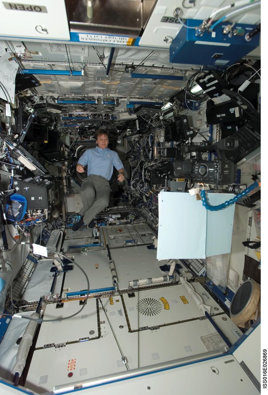 ISS016-E-026869 (3 Feb. 2008) --- Astronaut Peggy Whitson, Expedition 16 commander, floats in the Destiny laboratory of the International Space Station.