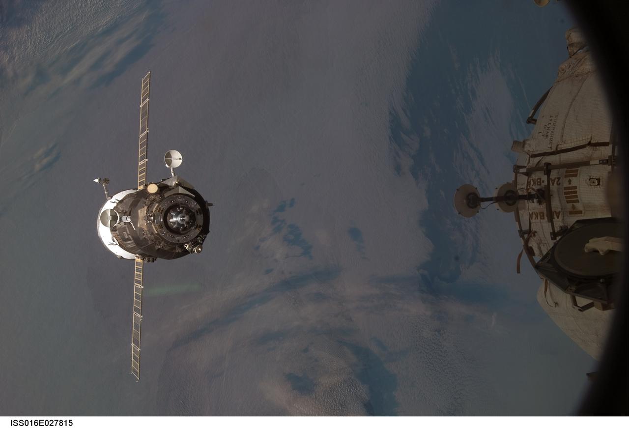 ISS016-E-027815 (7 Feb. 2008) --- Backdropped by a colorful Earth, an unpiloted Progress supply vehicle approaches the International Space Station. Progress 28 resupply craft launched at 7:03 a.m. (CST) on Feb. 5, 2008 from the Baikonur Cosmodrome in Kazakhstan to deliver more than 2.5 tons of food, fuel, oxygen and other supplies to the Expedition 16 crewmembers onboard the station. Progress automatically docked to the Pirs Docking Compartment at 8:30 a.m. (CST) on Feb. 7.