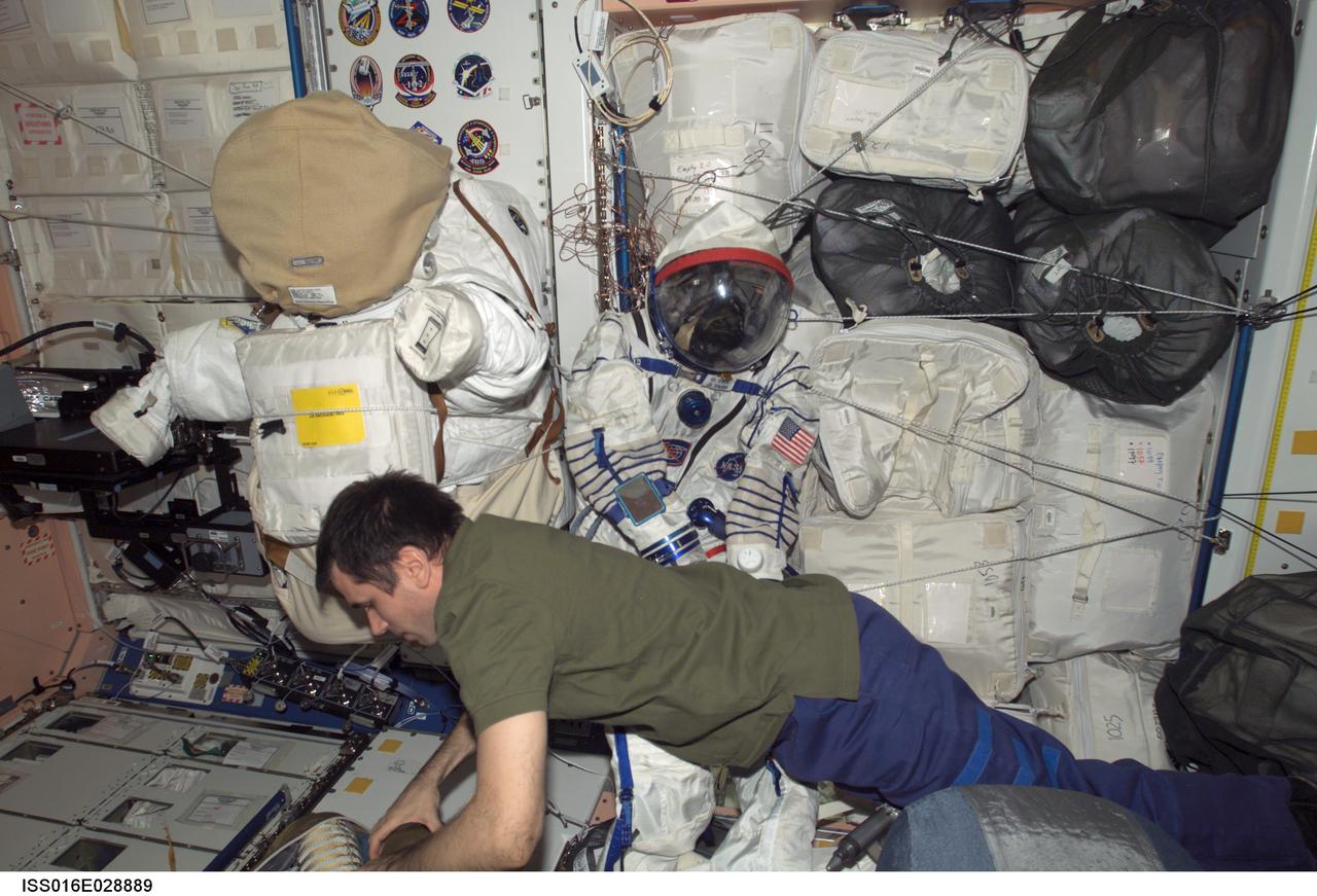 ISS016-E-028889 (9 Feb. 2008) --- Cosmonaut Yuri I. Malenchenko, Expedition 16 flight engineer representing Russia's Federal Space Agency, works in the Unity node of the International Space Station while Space Shuttle Atlantis (STS-122) is docked with the station.