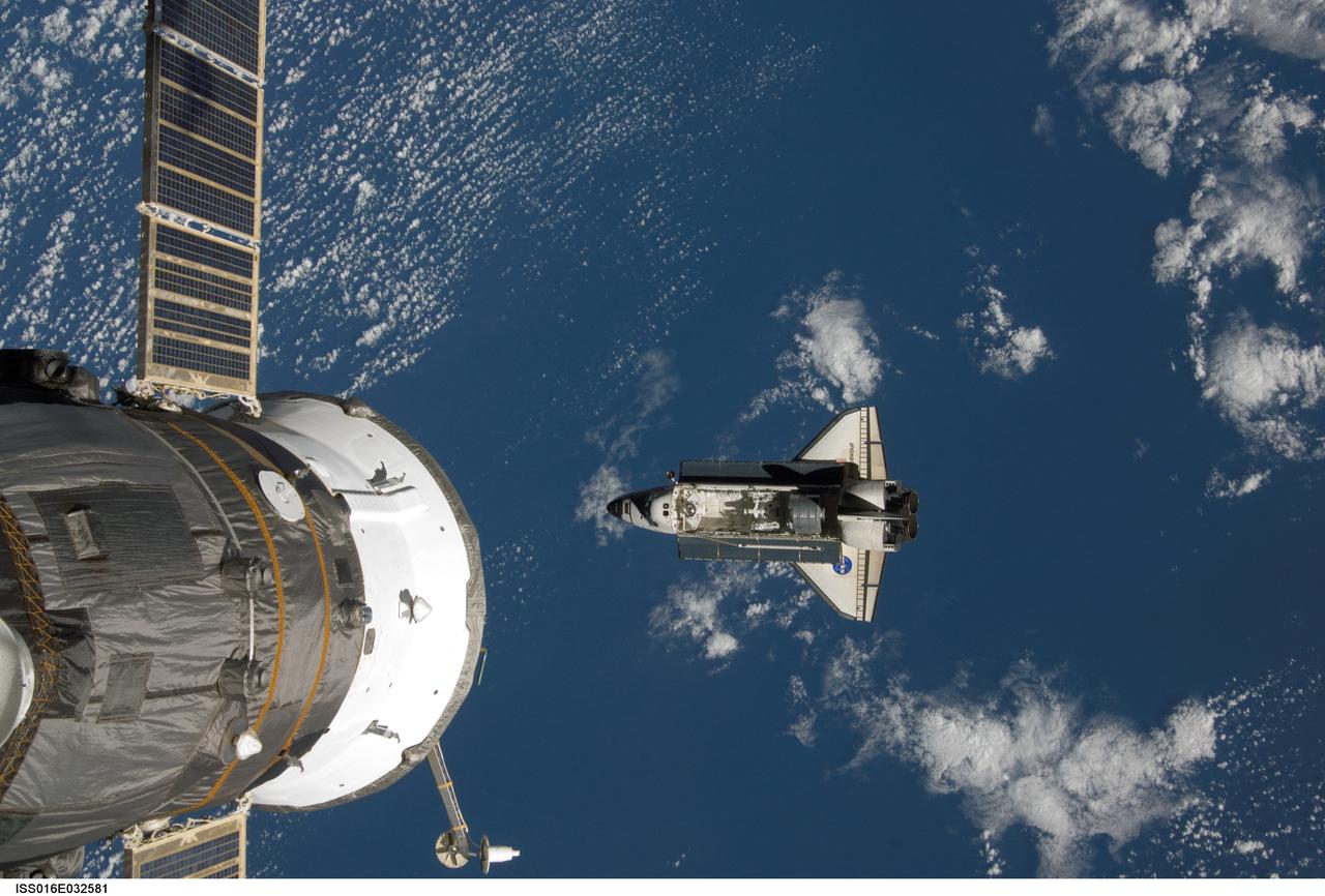 ISS016-E-032581 (12 March 2008) --- Backdropped by a blue and white Earth, Space Shuttle Endeavour approaches the International Space Station during STS-123 rendezvous and docking operations. Docking occurred at 10:49 p.m. (CDT) on March 12, 2008. The Canadian-built Dextre robotic system and the logistics module for the Japanese Kibo laboratory are visible in Endeavour's cargo bay. A Russian spacecraft, docked to the station, is visible in the foreground.