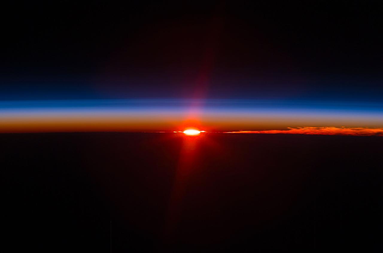 ISS017-E-005452 (26 April 2008) --- Layers of Earth's atmosphere, brightly colored as the sun sets over South America, are featured in this image photographed by an Expedition 17 crewmember on the International Space Station.