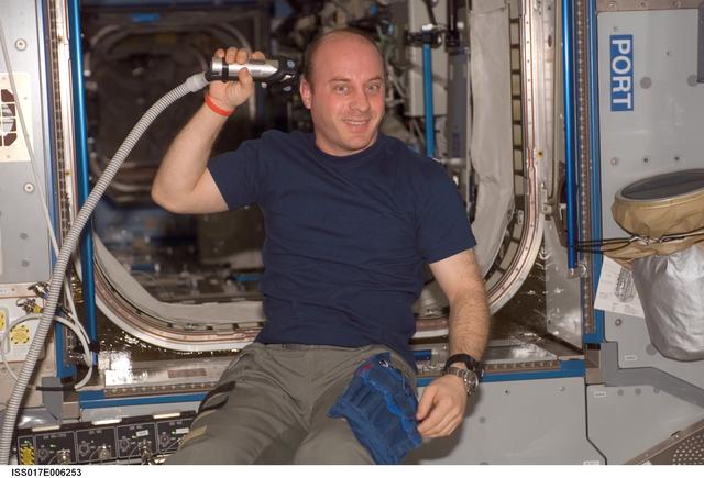 NASA image: Garrett Reisman, Expedition 17 Haircut in Harmony