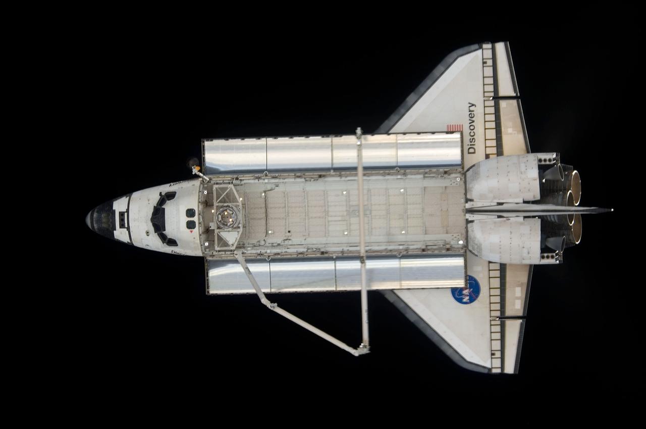 ISS017-E-009341 (11 June 2008) --- A view of the Space Shuttle Discovery backdropped against the blackness of space soon after the shuttle and the International Space Station began their post-undocking relative separation on June 11. One of the Expedition 17 crewmembers recorded the photo with a digital still camera.