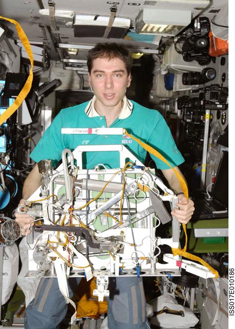 NASA image: Volkov holds EVA Tool Caddy in the SM during Expedition 17