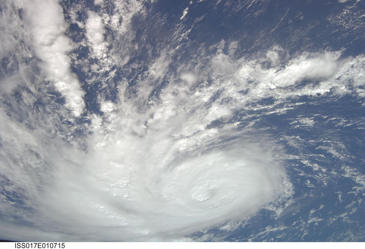 ISS017-E-010715 (9 July 2008) --- Hurricane Bertha was traveling northward at 10 knots (11.5 miles per hour) across the eastern part of the central Atlantic Ocean when this image was taken on July 9 by one of the Expedition 17 crewmembers aboard the International Space Station from a vantage point of 220 statute miles above the Earth. The sustained winds were 85 knots (97.9 miles per hour) with gusts up to 105 knots (121.0 miles per hour) and predicted to intensify. Mature and developing Cumulonimbus-type clouds are seen scattered through the cloud bands of the hurricane's system.