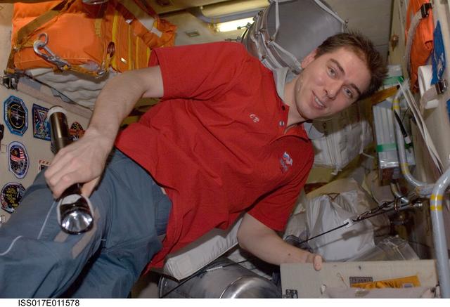 NASA image: Volkov works at Panel 427 in the FGB during Expedition 17