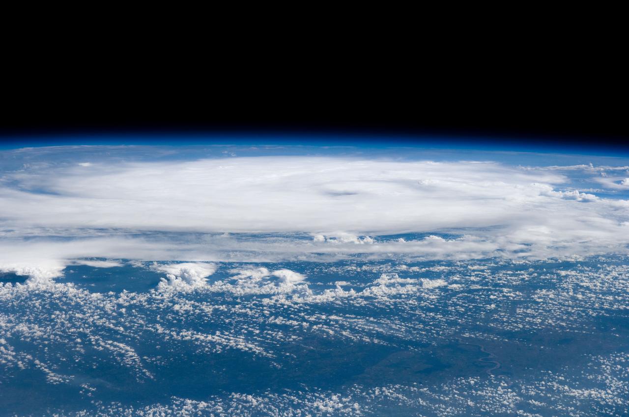 ISS017-E-012569 (4 Aug. 2008) --- A low oblique view of Tropical Storm Edouard, as it was seen from the International Space Station from a vantage point of 220 statute miles above Earth, stirs in the Gulf of Mexico roughly 24 hours prior to landfall at a point east of Galveston, Texas.