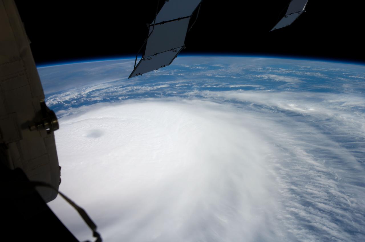 ISS017-E-015170 (4 Sept. 2008) --- Hurricane Ike was still a Category 4 storm on the morning of Sept. 4 when this photo was taken from the International Space Station's vantage point of 220 miles above the Earth. The season's ninth named storm was churning west-northwestward through the mid-Atlantic Ocean sporting winds of 120 nautical miles per hour with gusts to 145.
