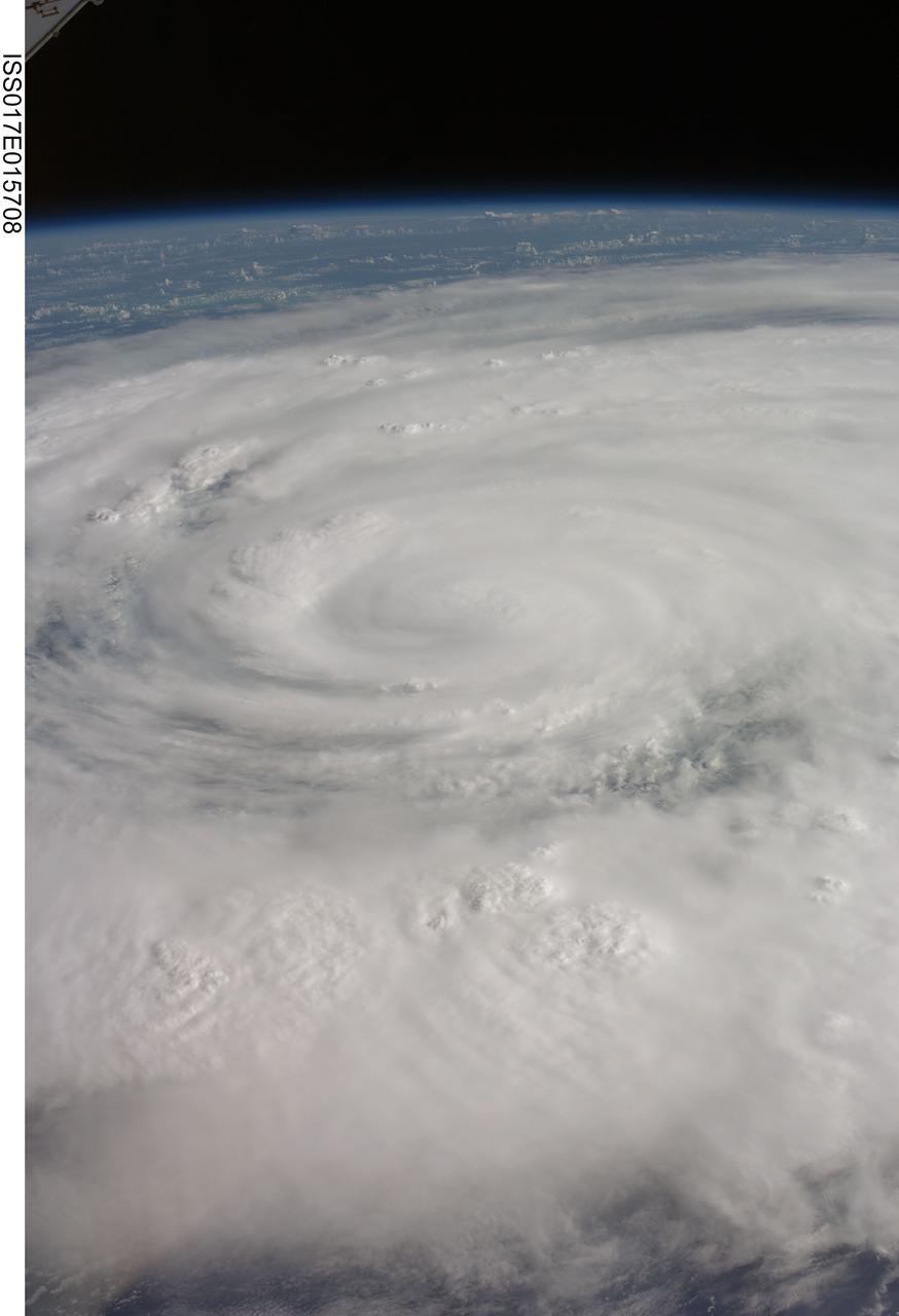 ISS017-E-015708 (9 Sept. 2008) --- Hurricane Ike covers more than half of Cuba in this image, photographed by the crew of ISS-17 aboard the International Space Station from a vantage point of 220 statute miles above Earth. The center of Ike was near 22.4 degrees north latitude and 82.4 degrees west longitude and moving 290 degrees at 11.7 miles per hour. Sustained winds were at 80.6 miles per hour, with gusts to 97.9 miles per hour and were forecast to strengthen as the eye moved back over the warm water in the gulf of Mexico.
