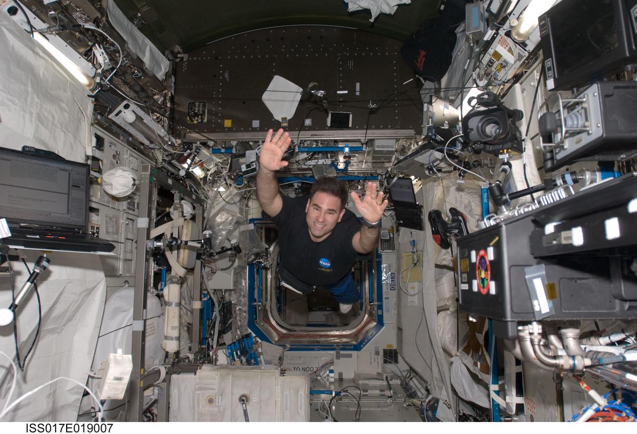 ISS017-E-019007 (13 Oct. 2008) --- NASA astronaut Greg Chamitoff, Expedition 17 flight engineer, floats in the Destiny laboratory of the International Space Station.