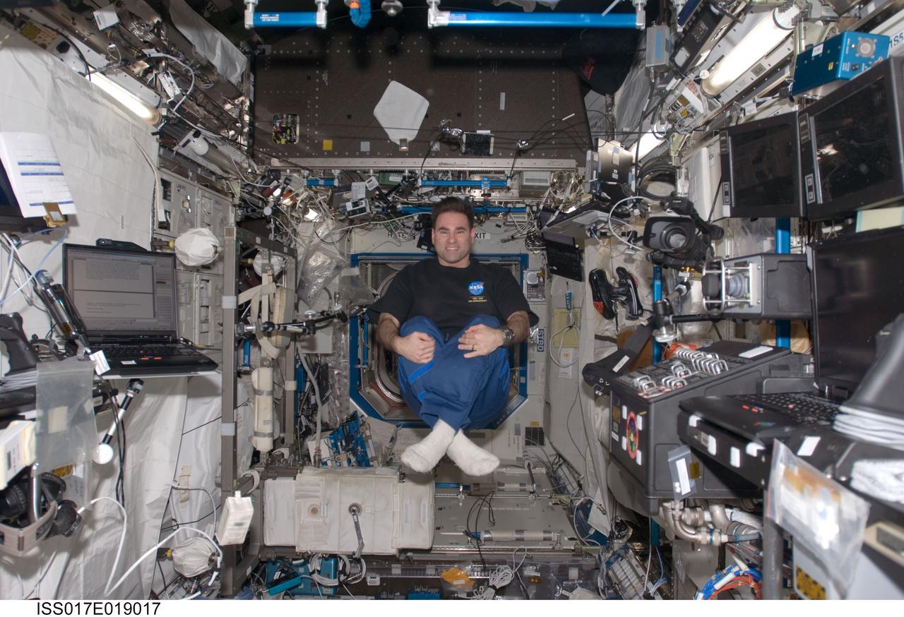 ISS017-E-019017 (13 Oct. 2008) --- NASA astronaut Greg Chamitoff, Expedition 17 flight engineer, poses for a photo while floating in the Destiny laboratory of the International Space Station.