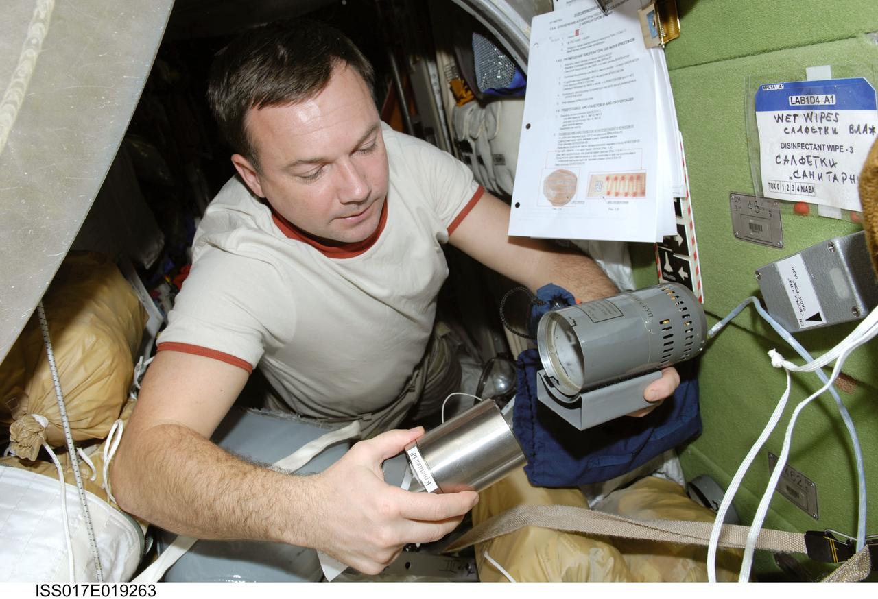 ISS017-E-019263 (18 Oct. 2008) --- Russian Federal Space Agency cosmonaut Yury Lonchakov, Expedition 18 flight engineer, works with hardware in the Zvezda Service Module of the International Space Station.