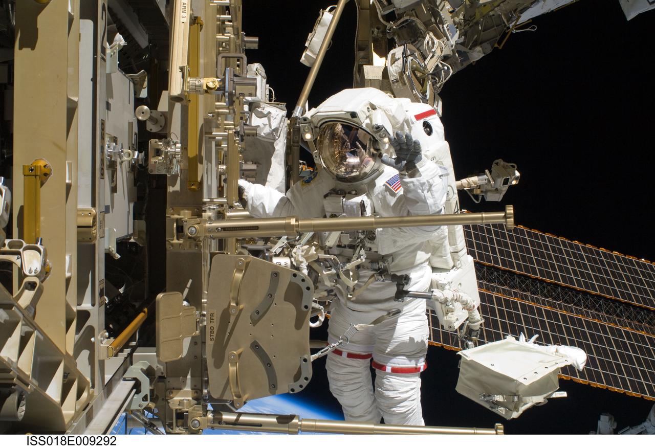 ISS018-E-009292 (20 Nov. 2008) --- Astronaut Shane Kimbrough, STS-126 mission specialist, participates in the mission's second scheduled session of extravehicular activity (EVA) as construction and maintenance continue on the International Space Station. During the six-hour, 45-minute spacewalk, Kimbrough and astronaut Heidemarie Stefanyshyn-Piper (out of frame), mission specialist, continued the process of removing debris and applying lubrication around the starboard Solar Alpha Rotary Joint (SARJ), replaced four more of the SARJ's 12 trundle bearing assemblies, relocated two equipment carts and applied lubrication to the station's robotic Canadarm2.