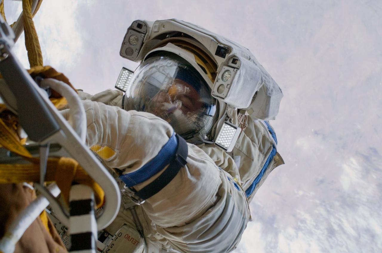 ISS018-E-014410 (23 Dec. 2008) --- Cosmonaut Yury Lonchakov, Expedition 18 flight engineer, performs a task during the Dec. 23 spacewalk on the International Space Station.