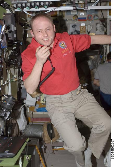 NASA image: Fincke uses Ham Radio in Service Module (SM)