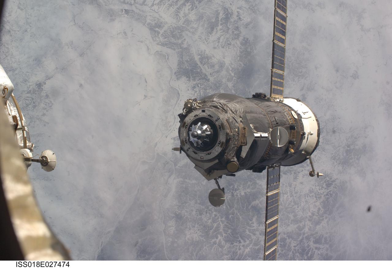 ISS018-E-027474 (5 Feb. 2009) --- An unpiloted ISS Progress 31 cargo craft, filled with trash and unneeded items, departs from the International Space Station’s Pirs Docking Compartment at 10:10:44 p.m. (CST) on Feb. 5, 2009. The Progress fired its thrusters to back away from the station for a little over two days of free flight to support engineering tests by Russian flight controllers. It will be commanded into a destructive reentry in Earth's atmosphere high above the Pacific Ocean at 1:32 a.m. (CST) on Feb 8. The departure clears the way for the arrival of the Progress 32 resupply vehicle, which is scheduled to link up to Pirs on Feb. 13.