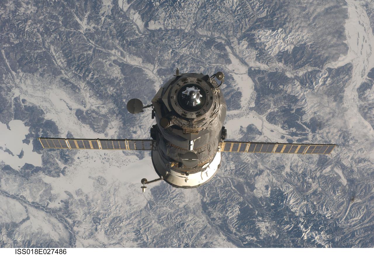 ISS018-E-027486 (5 Feb. 2009) --- An unpiloted ISS Progress 31 cargo craft, filled with trash and unneeded items, departs from the International Space Station’s Pirs Docking Compartment at 10:10:44 p.m. (CST) on Feb. 5, 2009. The Progress fired its thrusters to back away from the station for a little over two days of free flight to support engineering tests by Russian flight controllers. It will be commanded into a destructive reentry in Earth's atmosphere high above the Pacific Ocean at 1:32 a.m. (CST) on Feb 8. The departure clears the way for the arrival of the Progress 32 resupply vehicle, which is scheduled to link up to Pirs on Feb. 13.