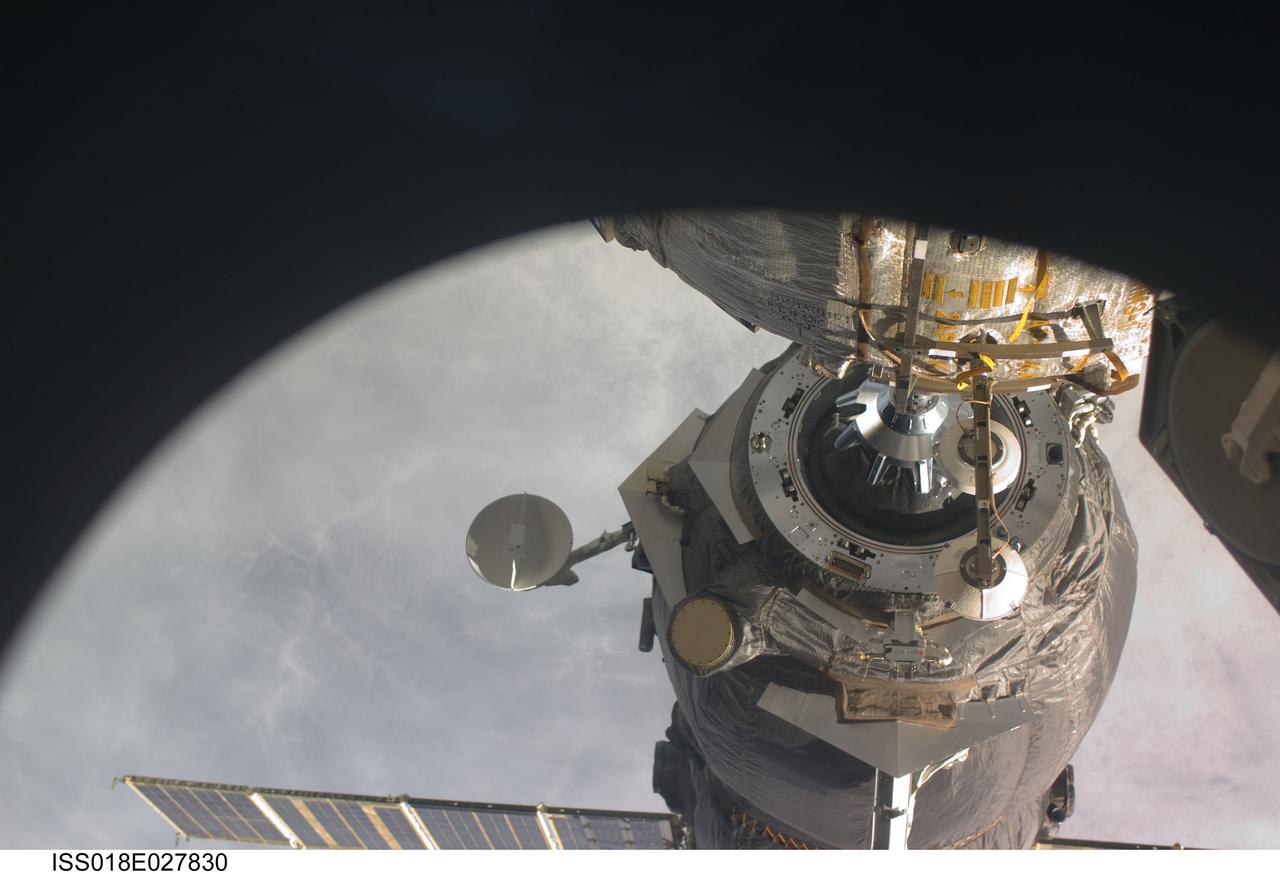 ISS018-E-027830 (5 Feb. 2009) --- An unpiloted ISS Progress 31 cargo craft, filled with trash and unneeded items, departs from the International Space Station’s Pirs Docking Compartment at 10:10:44 p.m. (CST) on Feb. 5, 2009. The Progress fired its thrusters to back away from the station for a little over two days of free flight to support engineering tests by Russian flight controllers. It will be commanded into a destructive reentry in Earth's atmosphere high above the Pacific Ocean at 1:32 a.m. (CST) on Feb 8. The departure clears the way for the arrival of the Progress 32 resupply vehicle, which is scheduled to link up to Pirs on Feb. 13.