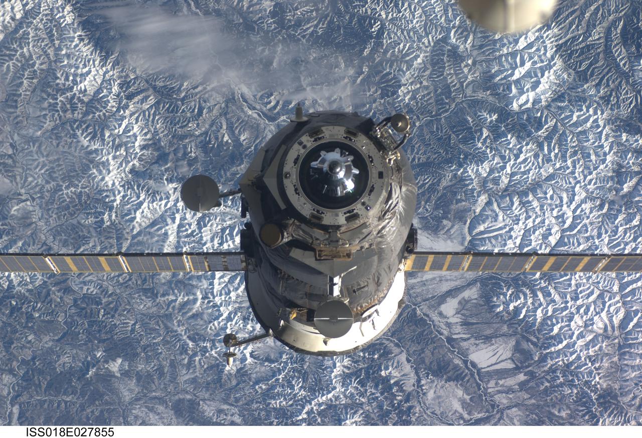 ISS018-E-027855 (5 Feb. 2009) --- An unpiloted ISS Progress 31 cargo craft, filled with trash and unneeded items, departs from the International Space Station’s Pirs Docking Compartment at 10:10:44 p.m. (CST) on Feb. 5, 2009. The Progress fired its thrusters to back away from the station for a little over two days of free flight to support engineering tests by Russian flight controllers. It will be commanded into a destructive reentry in Earth's atmosphere high above the Pacific Ocean at 1:32 a.m. (CST) on Feb 8. The departure clears the way for the arrival of the Progress 32 resupply vehicle, which is scheduled to link up to Pirs on Feb. 13.