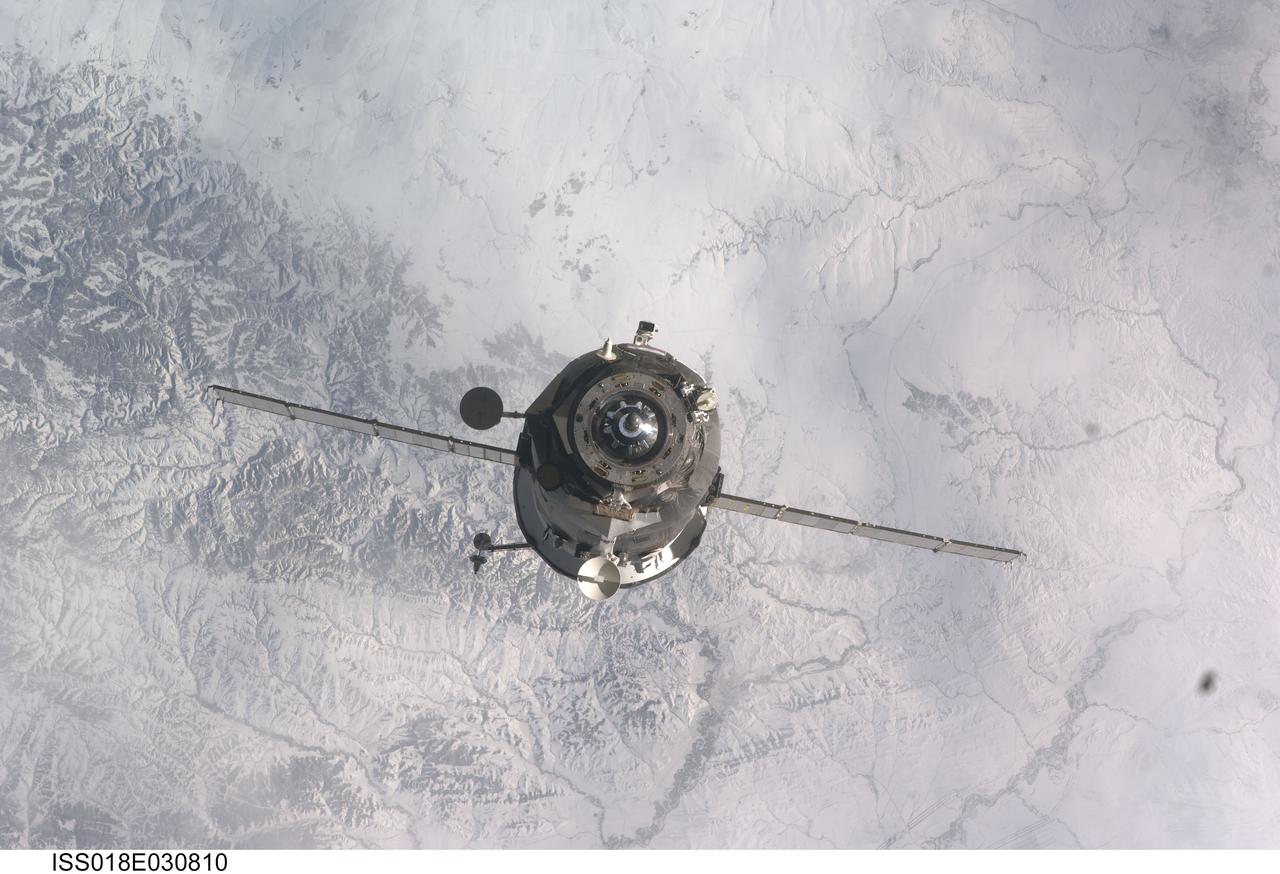 ISS018-E-030810 (13 Feb. 2009) --- An unpiloted Progress supply vehicle approaches the International Space Station, bringing more than two tons of food, fuel and other supplies to the Expedition 18 crewmembers aboard the station. Progress 32 docked to the Pirs Docking Compartment at 1:18 a.m. (CST) on Feb. 13, 2009, after a three day flight from the Baikonur Cosmodrome in Kazakhstan.