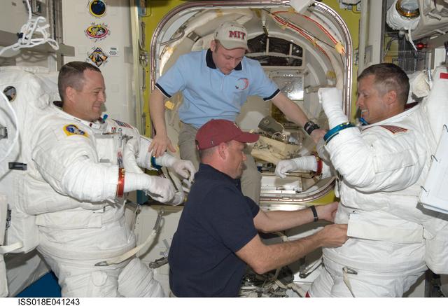 NASA image: STS-119 Extravehicular Activity (EVA) 1 Extravehicular Mobility Unit (EMU) Doff