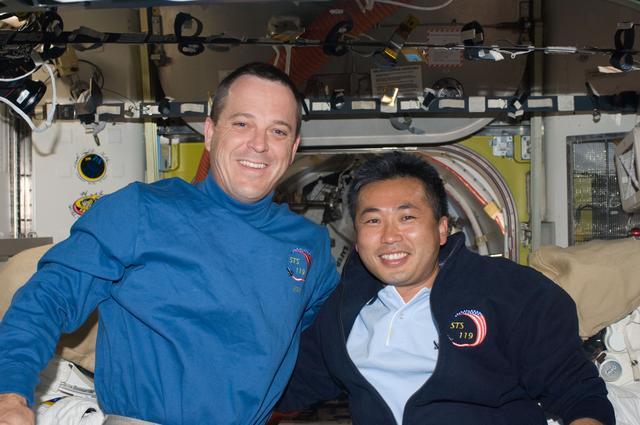 NASA image: Arnold and Wakata pose in Joint Airlock Quest
