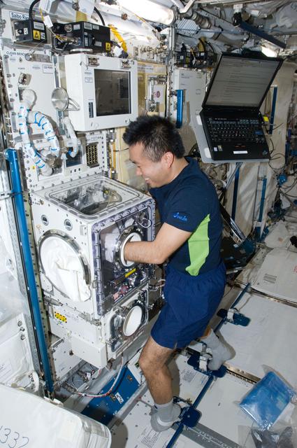 NASA image: DomeGene Sample Removal in Japanese Experiment Module (JEM)