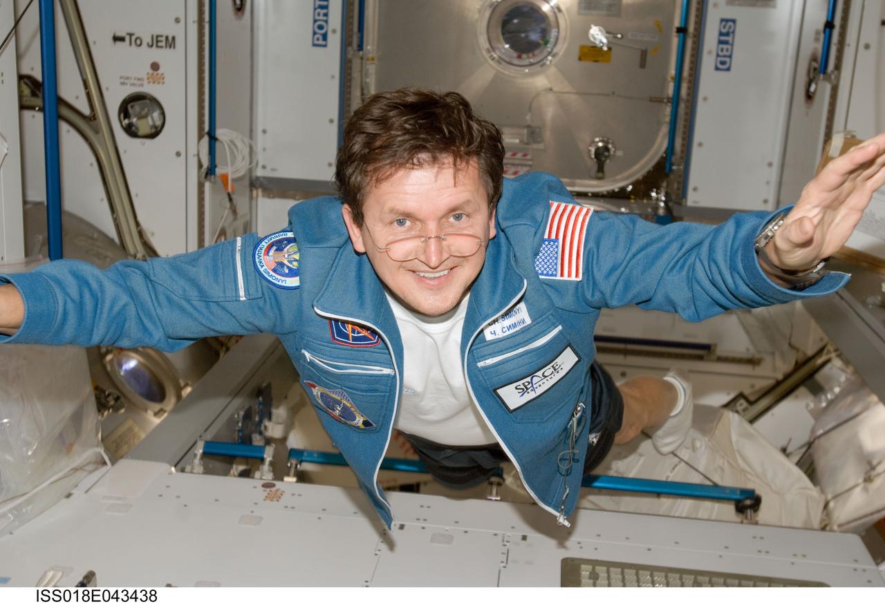 ISS018-E-043438 (29 March 2009) --- U.S. spaceflight participant Charles Simonyi floats in the Harmony node of the International Space Station.