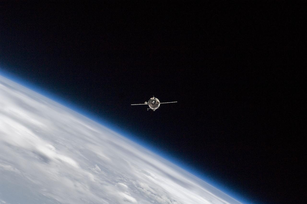 ISS018-E-043618 (28 March 2009) --- Backdropped against Earth's horizon and the blackness of space, Soyuz TMA-14 is photographed from the International Space Station as the two spacecraft approach each other in Earth orbit on March 28 prior to a docking that delivers the Expedition 19 crew to the orbital outpost.