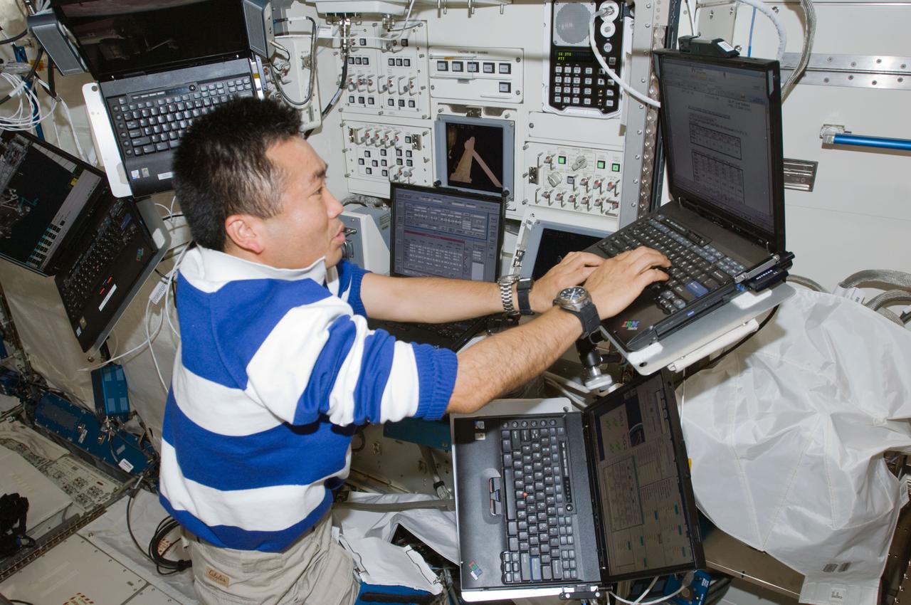 ISS018-E-044134 (31 March 2009) --- Japan Aerospace Exploration Agency (JAXA) astronaut Koichi Wakata, Expedition 18/19 flight engineer, uses a computer at the Japanese Remote Manipulator System (JEM-RMS) work station in the Kibo laboratory of the International Space Station.