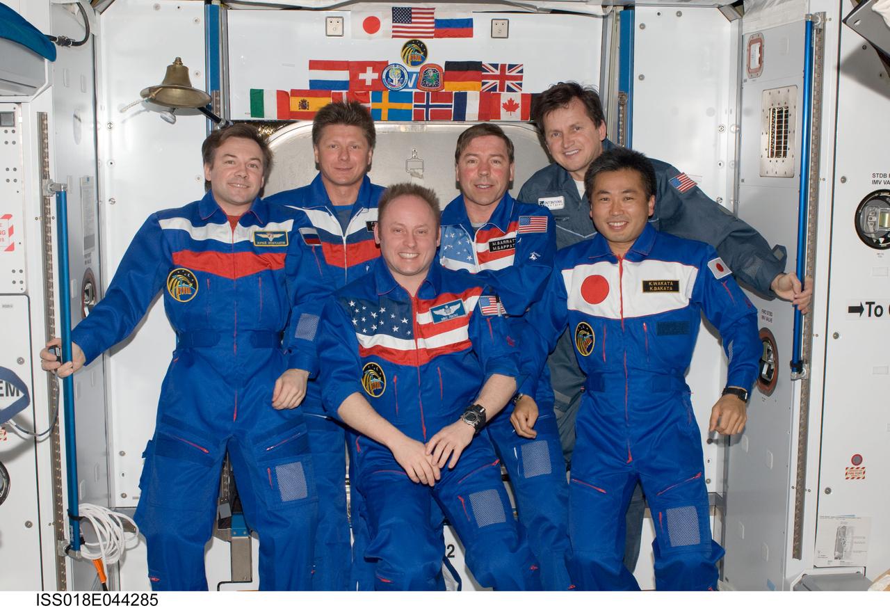 ISS018-E-044285 (1 April 2009) --- Crewmembers on the International Space Station pose for a group photo following a joint crew news conference in the Harmony node of the International Space Station. Pictured from the left (front row) are cosmonaut Yury Lonchakov, Expedition 18 flight engineer; NASA astronaut Michael Fincke, Expedition 18 commander; and Japan Aerospace Exploration Agency (JAXA) astronaut Koichi Wakata, Expedition 18/19 flight engineer. From the left (back row) are cosmonaut Gennady Padalka, Expedition 19 commander; NASA astronaut Michael Barratt, Expedition 19 flight engineer; and U.S. spaceflight participant Charles Simonyi.