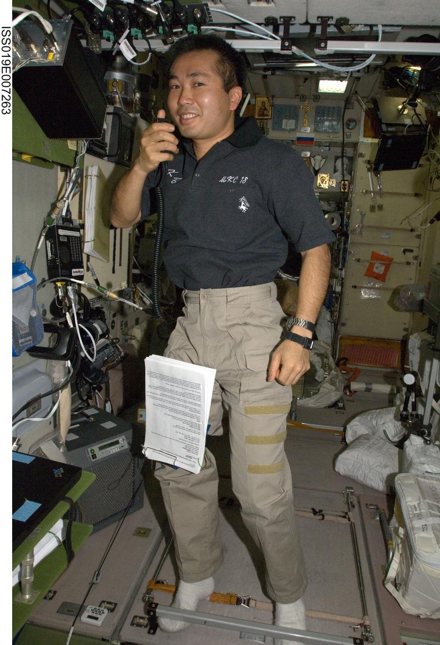 ISS019-E-007263 (17 April 2009) --- Japan Aerospace Exploration Agency (JAXA) astronaut Koichi Wakata, Expedition 19/20 flight engineer, uses a communication system in the Zvezda Service Module of the International Space Station.