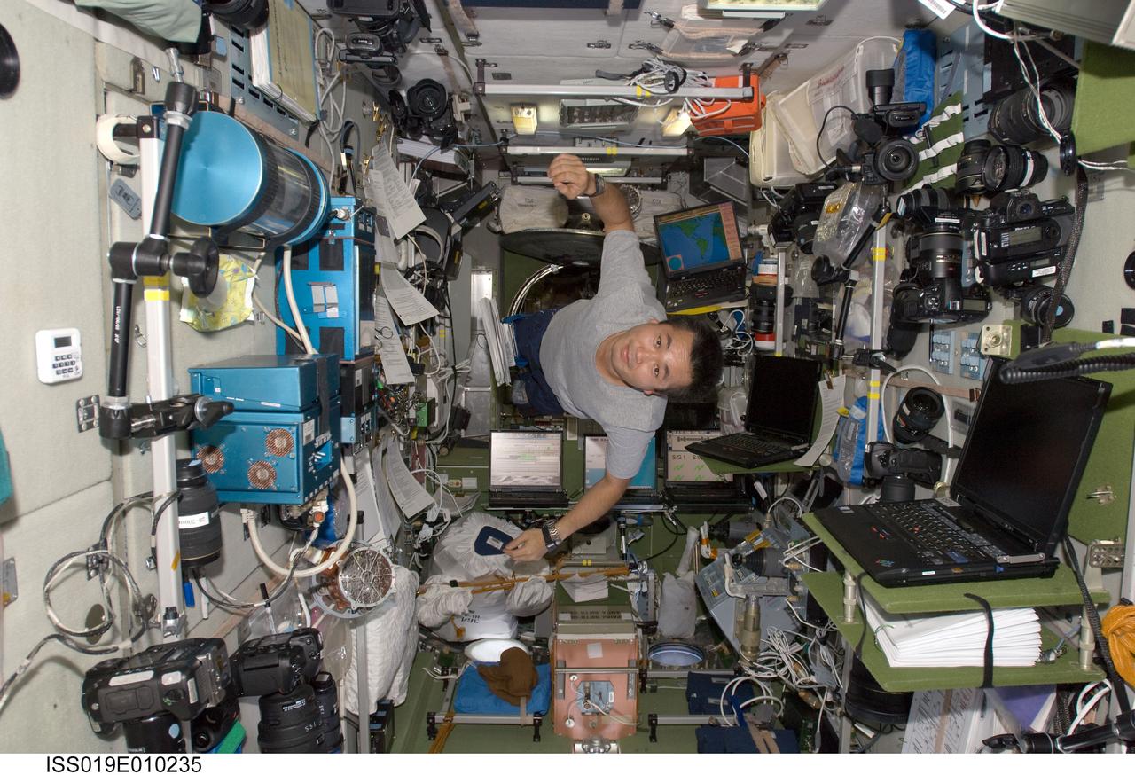 ISS019-E-010235 (25 April 2009) --- Japan Aerospace Exploration Agency (JAXA) astronaut Koichi Wakata, Expedition 19/20 flight engineer, floats in the Zvezda Service Module of the International Space Station.