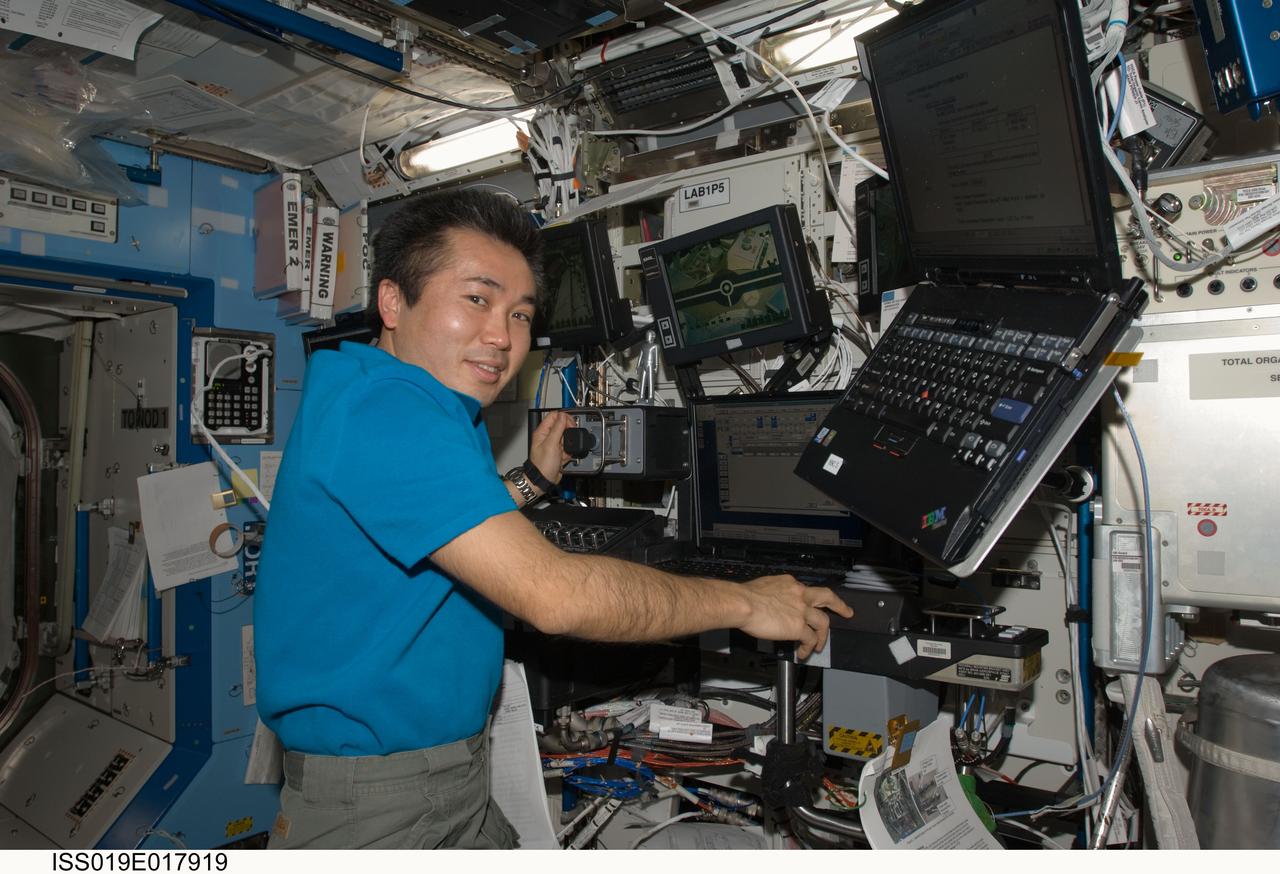 ISS019-E-017919 (19 May 2009) --- Japan Aerospace Exploration Agency (JAXA) astronaut Koichi Wakata, Expedition 19/20 flight engineer, works controls at the station?s Canadarm2 robotic arm in the Destiny laboratory of the International Space Station.
