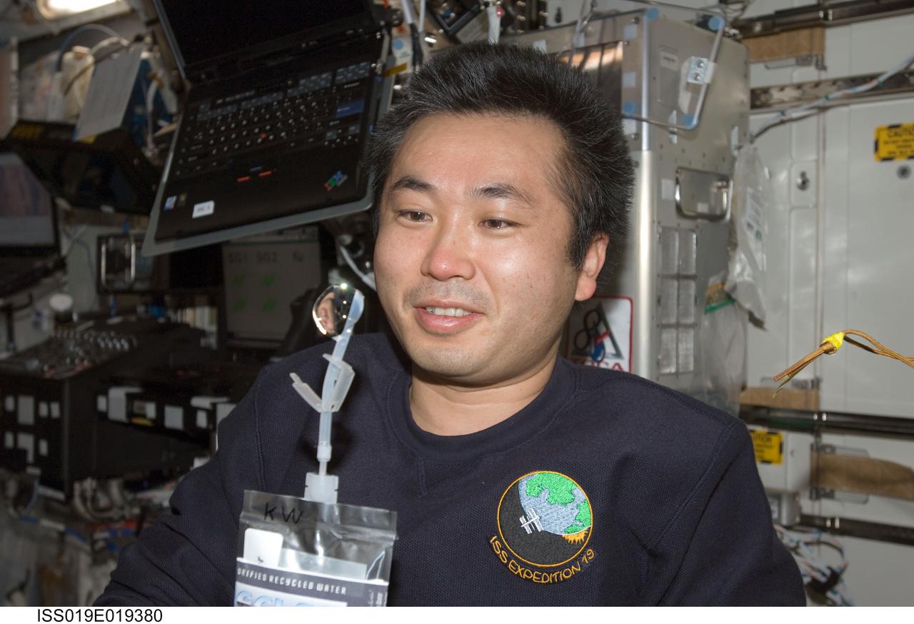 ISS019-E-019380 (22 May 2009) --- Japan Aerospace Exploration Agency (JAXA) astronaut Koichi Wakata, Expedition 19/20 flight engineer, squeezes a bubble out of his beverage container in the Destiny laboratory of the International Space Station.