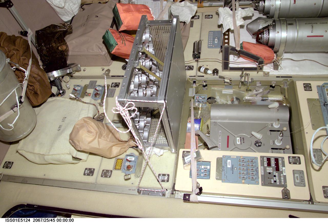 ISS01-E-5124 (December 2000) --- A medium closeup view, photographed with a digital still camera, shows part of the  galley area on the International Space Station's Zvezda Service Module. The picture should be viewed vertically with potable water heater (right side of this frame before suggested 90-degree rotation) and distribution unit in the top half.
