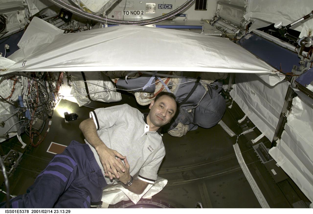 ISS01-E-5378 (14 February 2001) --- Astronaut Mark L. Polansky is pictured in the new Destiny laboratory. The STS-98 and Expedition One crews have been busy in the lab since its hatch was opened earlier in the week. This photo was taken with a digital still camera.