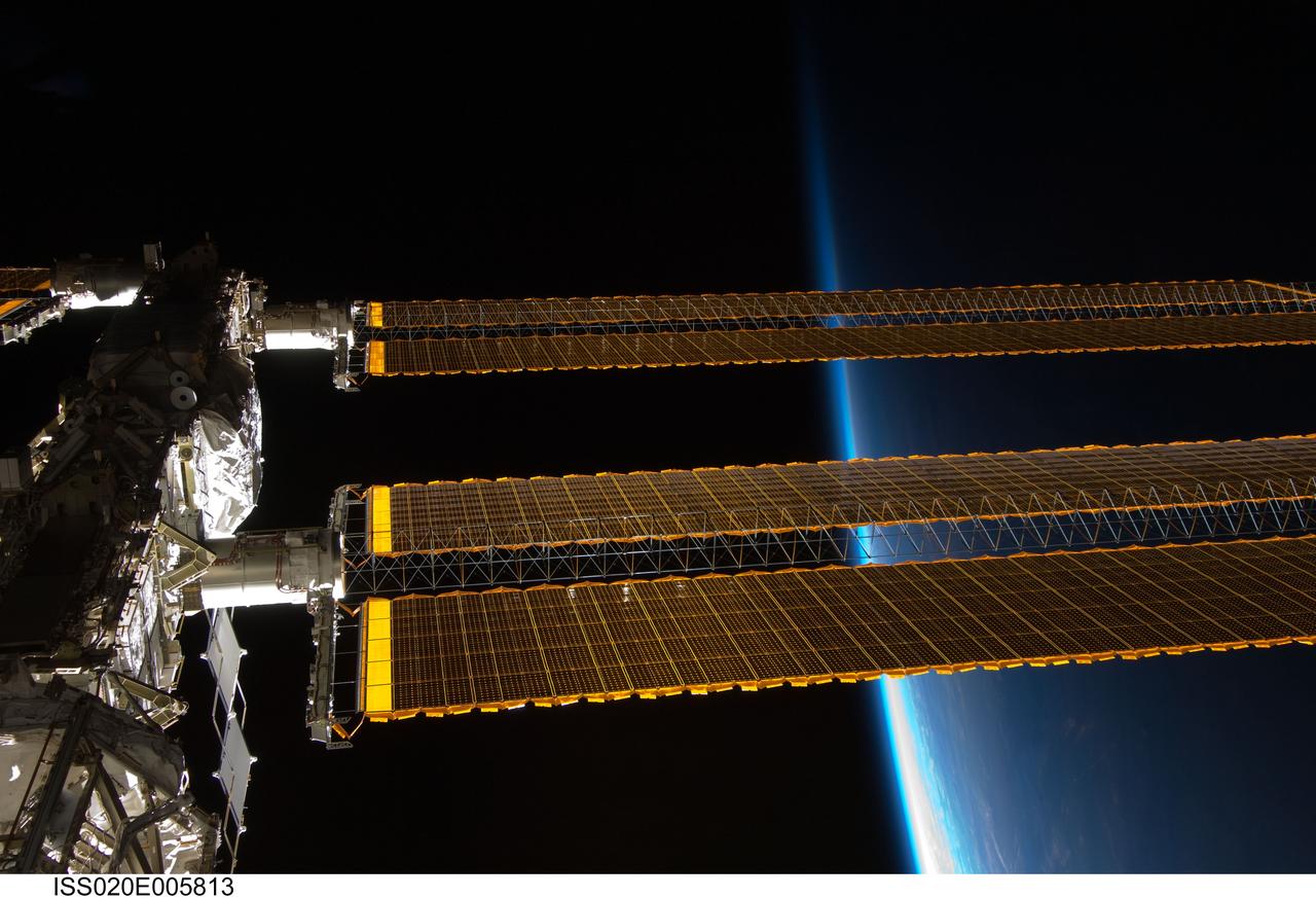 ISS020-E-005813 (31 May 2009) --- Backdropped by Earth's horizon and the blackness of space, a portion of the International Space Station is featured in this image photographed by an Expedition 20 crew member aboard the station.
