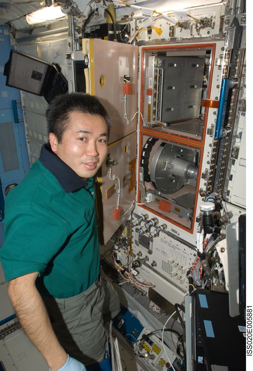 ISS020-E-005881 (1 June 2009) --- Japan Aerospace Exploration Agency (JAXA) astronaut Koichi Wakata, Expedition 20 flight engineer, conducts the current periodic humidity check on the Cell Biology Experiment Facility (CBEF) in the Saibo Rack in the Kibo laboratory of the International Space Station. Wakata opened the facility’s door for wiping up any condensation inside the micro-G & 1G section, if present, and also secured floating fan mesh with Kapton tape.