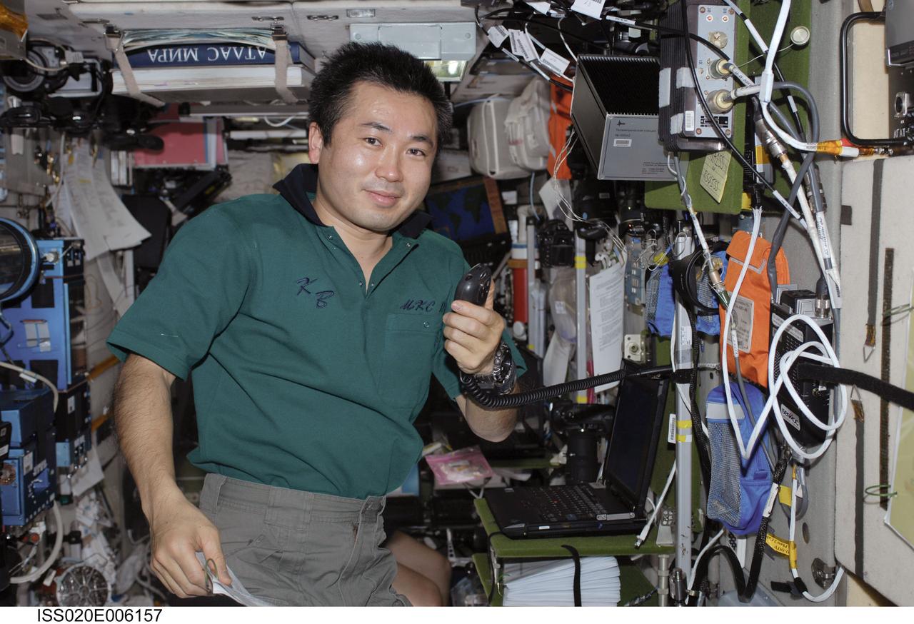 ISS020-E-006157 (3 June 2009) --- Japan Aerospace Exploration Agency (JAXA) astronaut Koichi Wakata, Expedition 20 flight engineer, uses amateur radio gear in the Zvezda Service Module of the International Space Station.